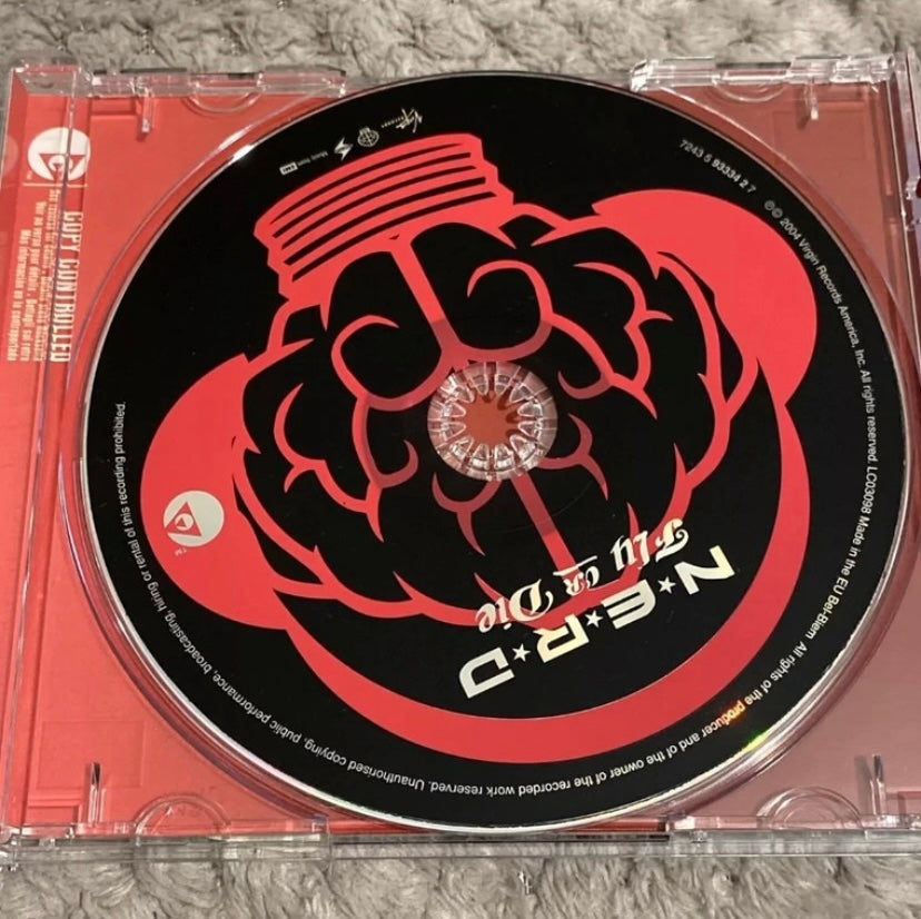 CD musique import N. E. R. D.  Pharell Williams. Fly or die