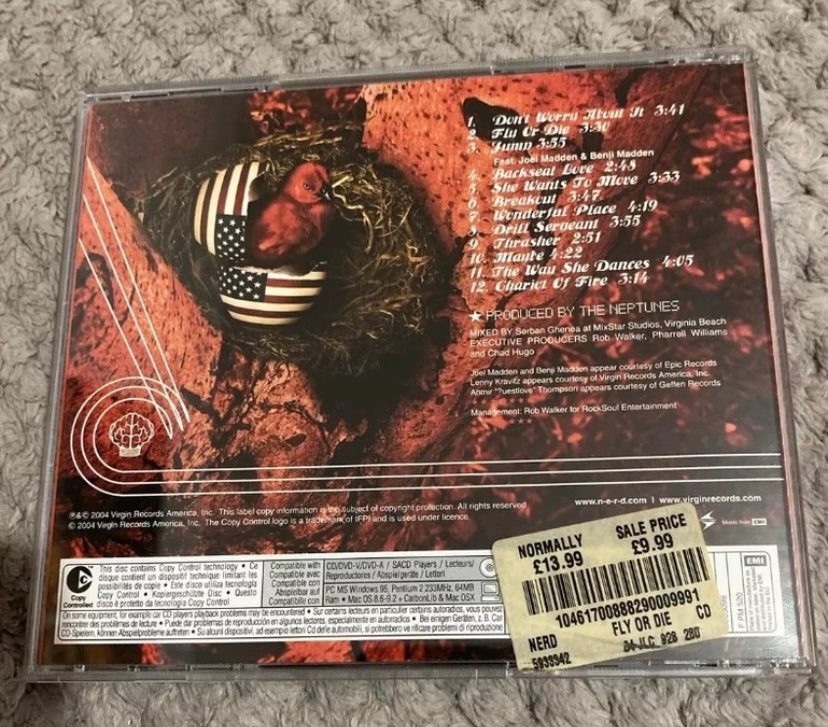 CD musique import N. E. R. D.  Pharell Williams. Fly or die