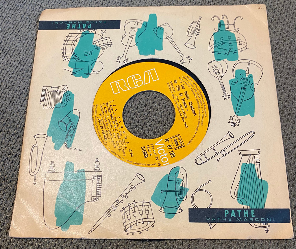 Disque vinyle 45 tours les petits chanteurs de l’île de France. Qui peut dire où va le vent