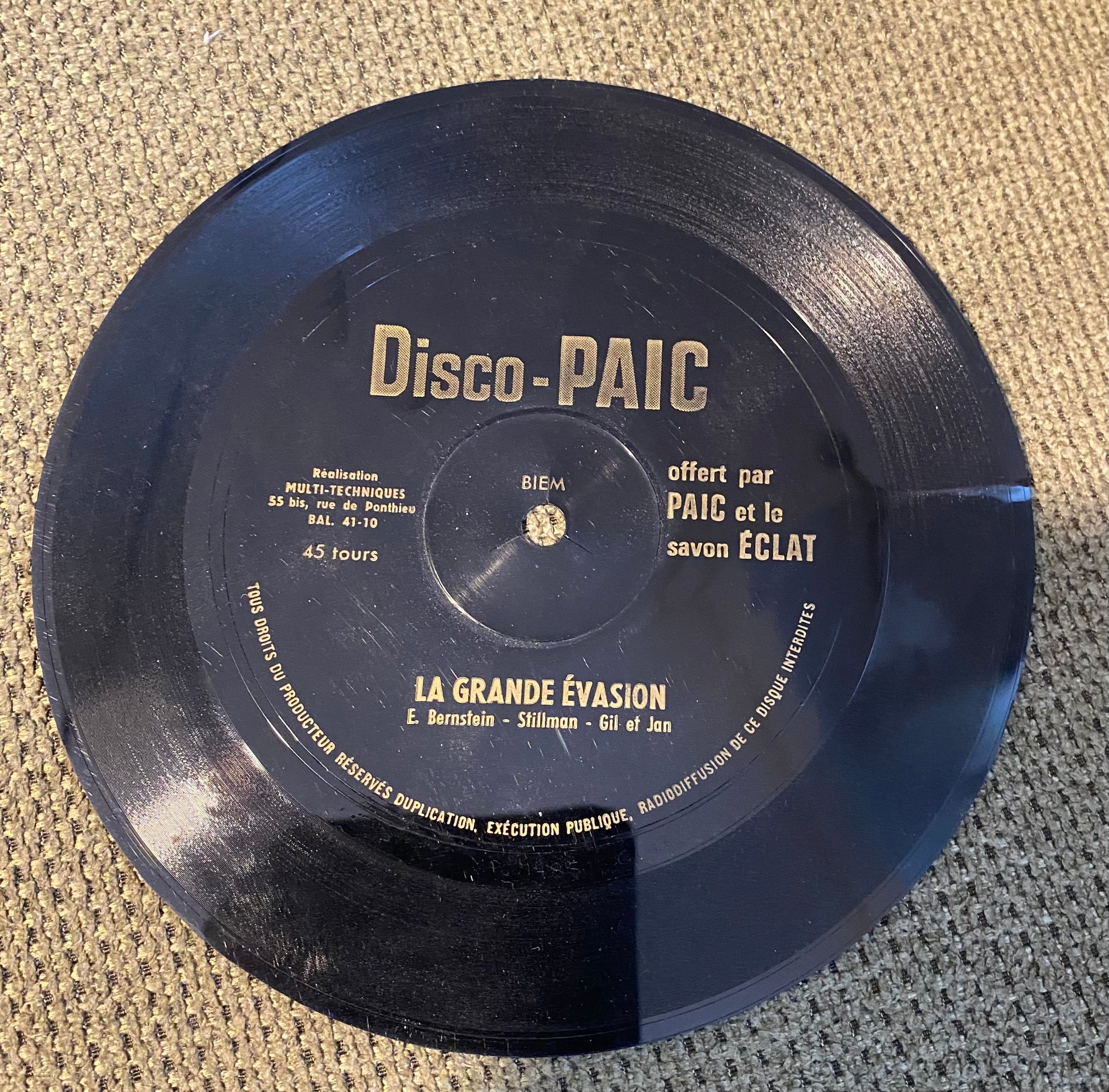 Disque vinyle souple, la grande évasion offert par Paic et le savon éclat.
