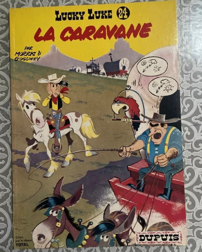 BD ancienne Lucky Luke. La caravane numéro 24. Dupuis. Total 1972. Bd souple