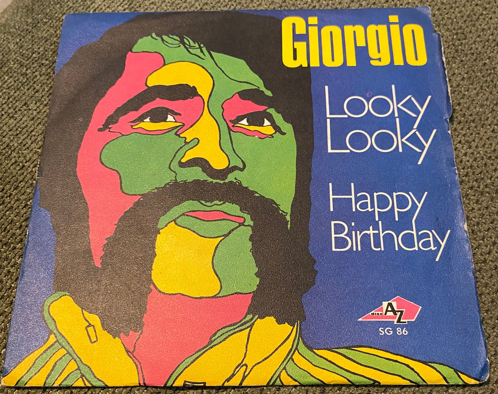 Disque vinyle 45 tours Giorgio. Looky Looky