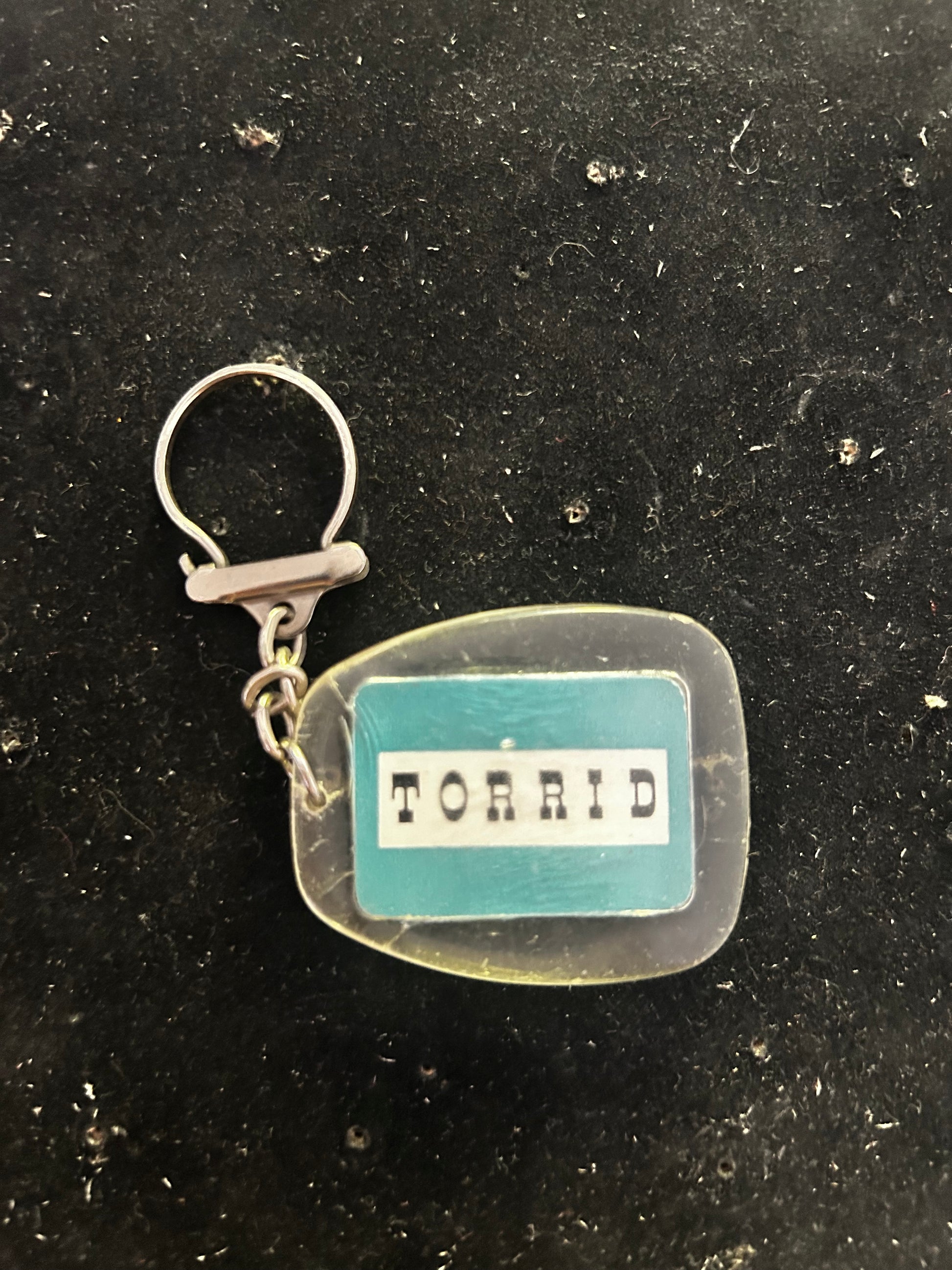 Porte clefs ancien Torrid. M