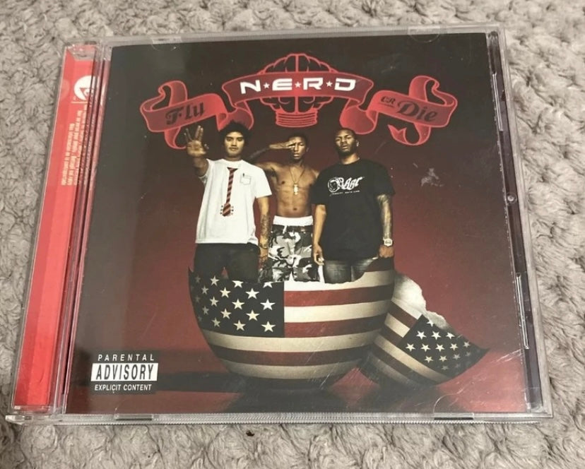 CD musique import N. E. R. D.  Pharell Williams. Fly or die