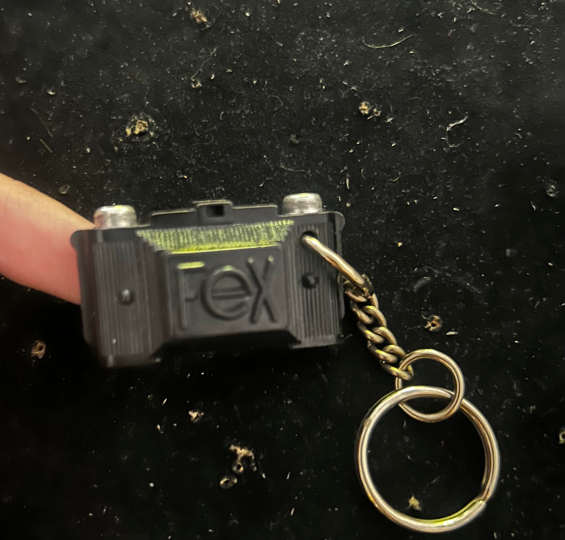 Porte clés FEX. Appareil photo