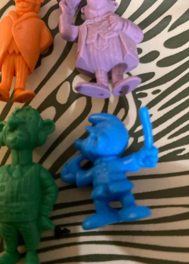 Figurines monochromes publicitaires anciennes Lot de 4. Tintin. Schtroumpfs