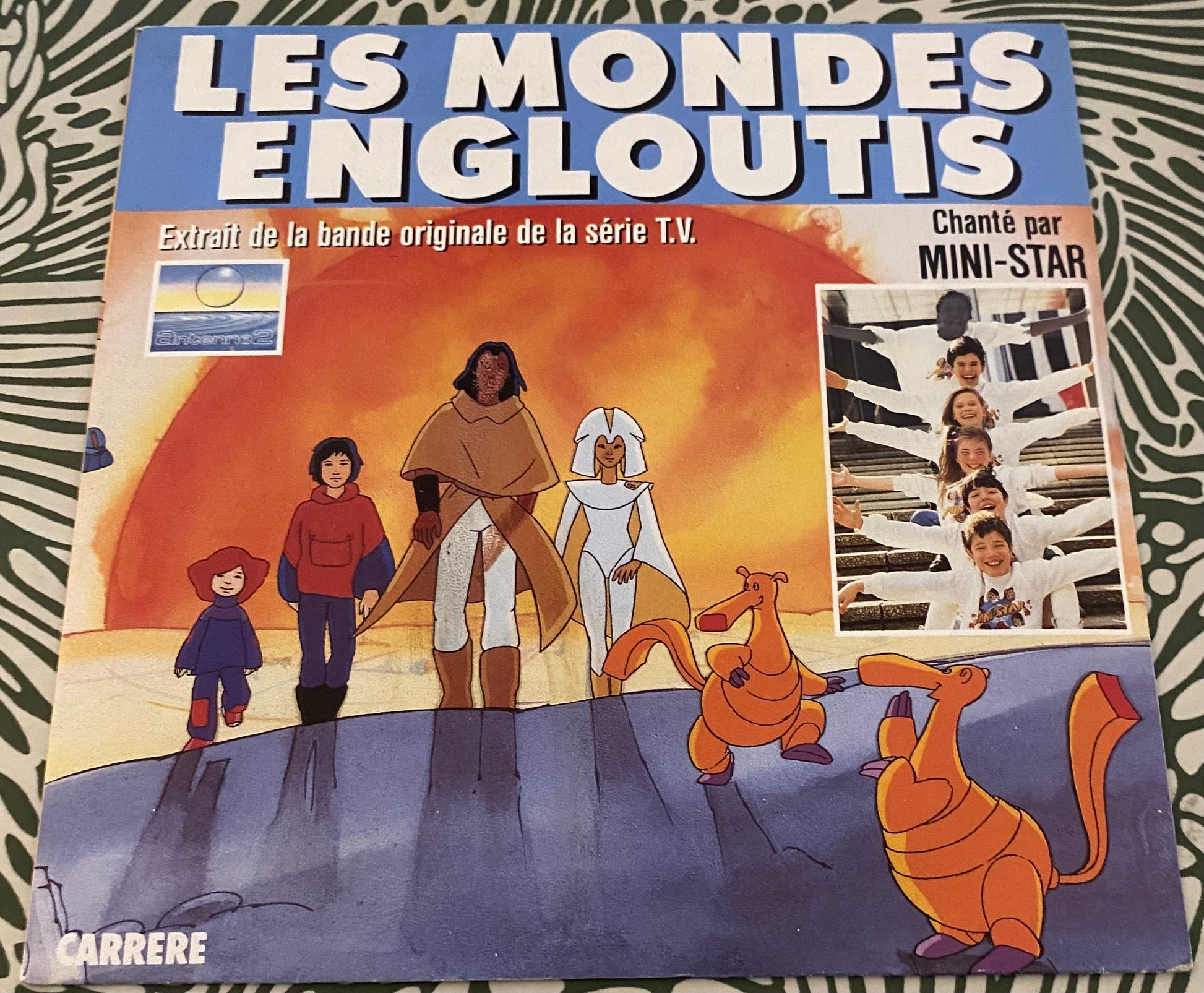 Disque vinyle 45 Tours Les mondes engloutis. Bande originale de la serie TV chanté par Mini star.